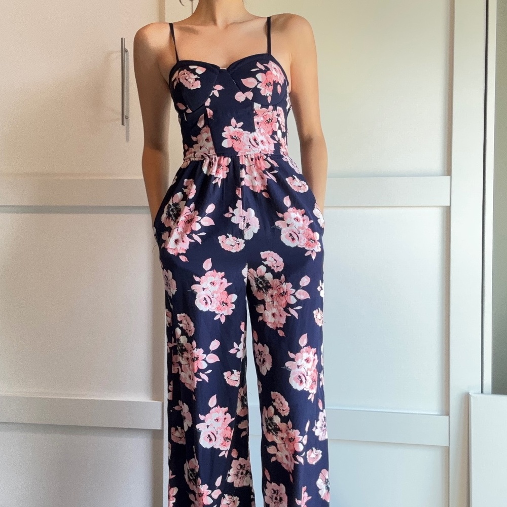 A lightweight floral jumpsuit, perfect for warm-weather wedding.